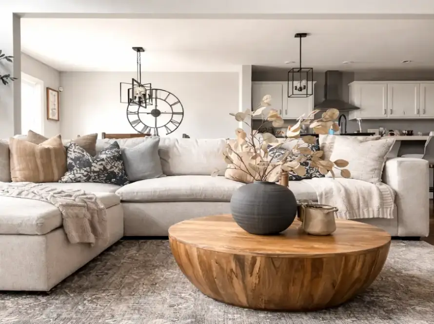 How to balance wall decor with furniture and lighting in a modern living room