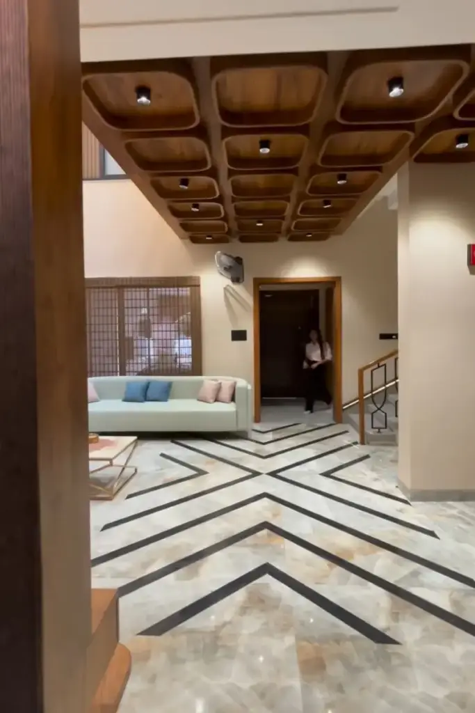 POP ceiling with wooden accents and recessed lighting in a modern interior